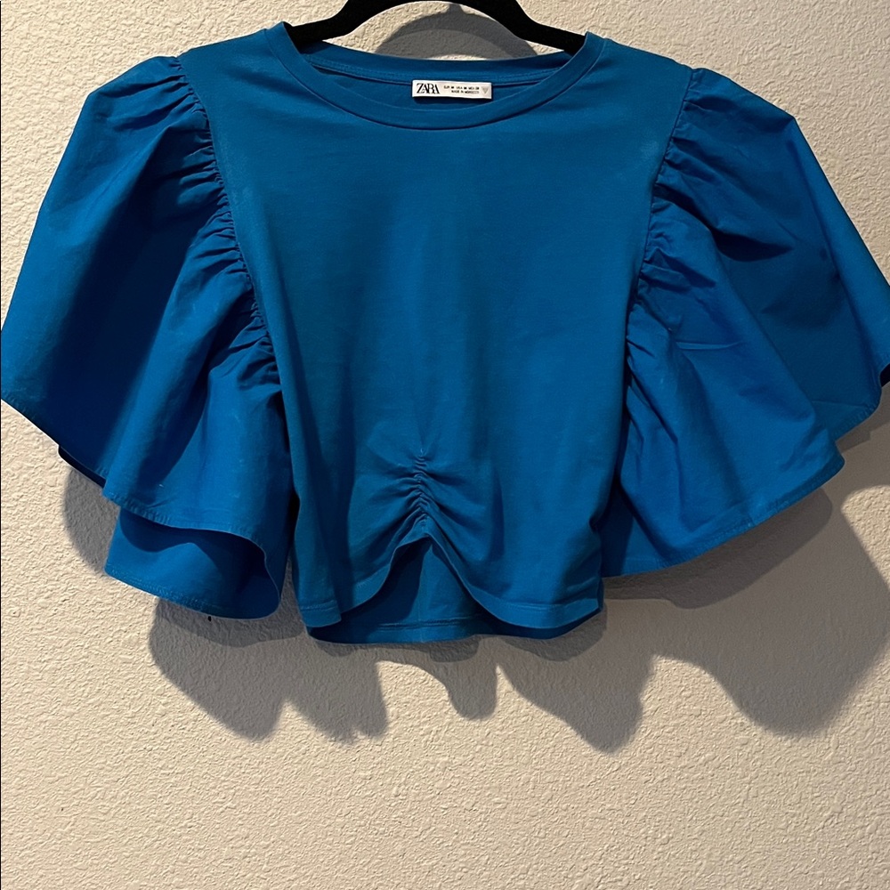 Zara Teal Puff Sleeve Ruched at Waist Crop Top
100% cotton
Sz M - Picture 1 of 12